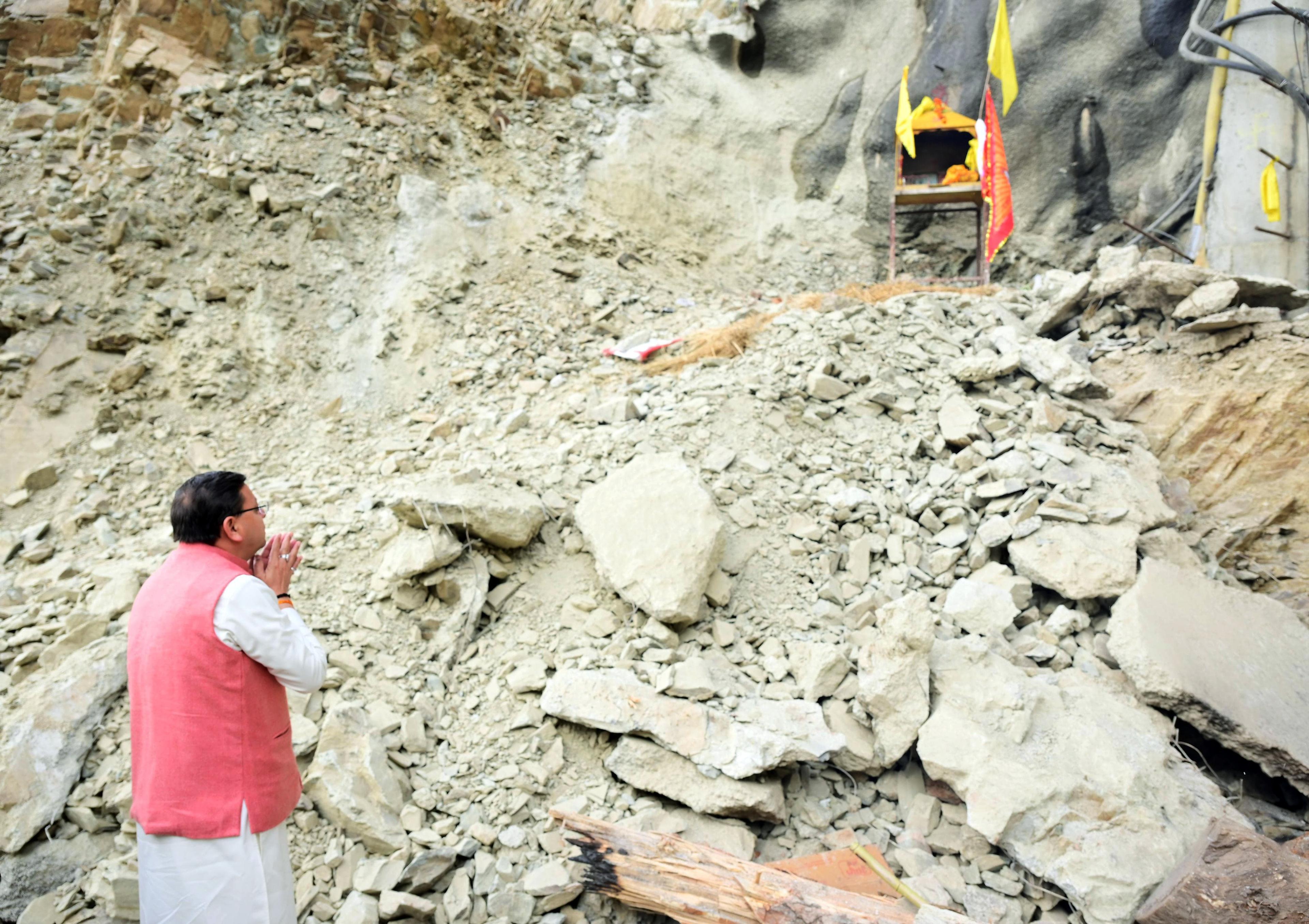 Uttarkashi, Nov 28 (ANI): Uttrakhand Chief Minister Pushkar Singh Dhami prays at the Silkyara tunnel rescue operation site in Uttarkashi on Tuesday. (ANI Photo)  (Pushkar Singh Dhami-X)