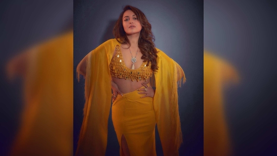Sonakshi Sinha's outfit comprises a sequin blouse, a thigh-high slit skirt and a cape. (Instagram/@aslisona)