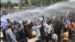 Police use water cannons to disperse protesting doctors in Jaipur on Tuesday. (PTI) Police use water cannons to disperse protesting doctors in Jaipur on Tuesday. (PTI)