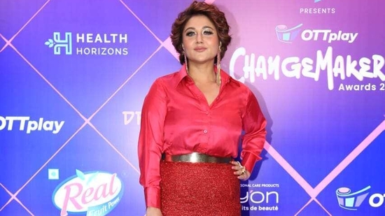 Swastika Mukerji made a stunning appearance at the OTTPlay ChangeMakers Awards on Sunday in a red shirt and skirt. She took home the trophy for ‘Breaking Barriers in Cinema’. She was seen in the Netflix film Qala. (Varinder Chawla)
