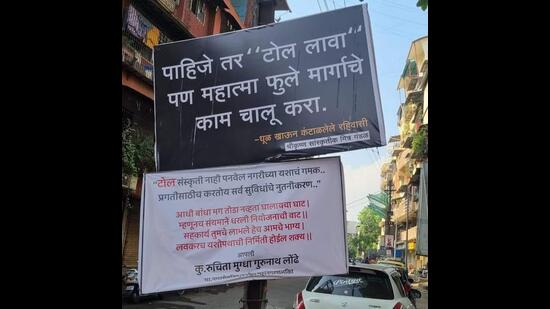 Residents put up a board taking aa dig at the local administration, and local corporator responded in the same vein. (HT PHOTO) Residents put up a board taking aa dig at the local administration, and local corporator responded in the same vein. (HT PHOTO)