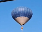 A still from the video of the accident when a hot air balloon caught fire in Mexico. (Twitter) A still from the video of the accident when a hot air balloon caught fire in Mexico. (Twitter)