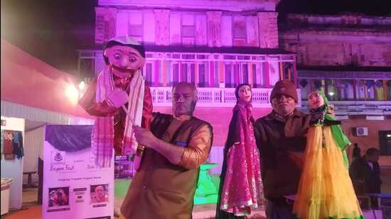 Pradeep Nath Tripathi (left) and KK Rai with rod puppets after a performance. (HT Photo) Pradeep Nath Tripathi (left) and KK Rai with rod puppets after a performance. (HT Photo)