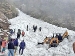 Rescue team members search for survivors after an avalanche in Sikkim on Tuesday. (REUTERS) Rescue team members search for survivors after an avalanche in Sikkim on Tuesday. (REUTERS)