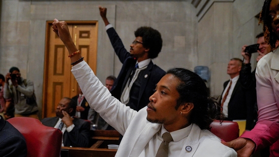 Rep. Justin Pearson and Rep. Justin Jones raise their fists as a video of last week's gun control demonstration at the statehouse is screened and Republicans who control the Tennessee House of Representatives prepare to vote on whether to expel them for their role in it, in Nashville, Tennessee, U.S., April 6, 2023.(REUTERS)