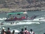Some videos of the incident have also surfaced on social media, in which boatmen are seen using their boats to rescue people trapped in the river and on rocks.(Twitter ) Some videos of the incident have also surfaced on social media, in which boatmen are seen using their boats to rescue people trapped in the river and on rocks.(Twitter )