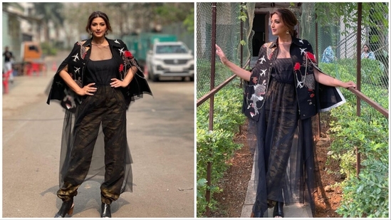 Sonali Bendre ups her street-style game in this all-black separates comprising of a corset-inspired top, metallic-hued trousers and a quirky fashionable jacket. (Instagram/@sonalibendre)