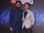 Abhishek Bachchan and Hrithik Roshan posed together at the Jio Studios event in Mumbai on Wednesday. Hrithik will next be seen in Fighter and War 2 and Abhishek has Ghumar in pipeline. (Varinder Chawla) Abhishek Bachchan and Hrithik Roshan posed together at the Jio Studios event in Mumbai on Wednesday. Hrithik will next be seen in Fighter and War 2 and Abhishek has Ghumar in pipeline. (Varinder Chawla)