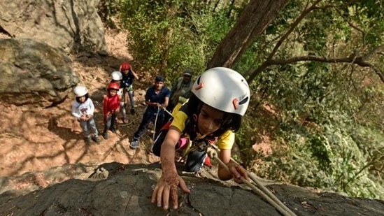 Rock Climbing in Hampi: Hampi, in Karnataka, is known for its unique boulder formations, making it a popular destination for rock climbers. (File Photo)