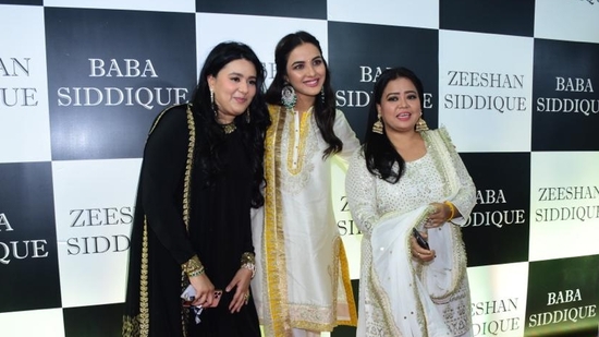 Jasmin Bhasin with Bharti Singh at Baba Siddique's Iftar bash party. They both decked up in white ethnic outfits. 