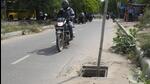 A deep sewer manhole lies open in the cycle track lane in Sector 39 near Cyber Parkin Gurugram on Tuesday. (Parveen Kumar/HT Photo) A deep sewer manhole lies open in the cycle track lane in Sector 39 near Cyber Parkin Gurugram on Tuesday. (Parveen Kumar/HT Photo)