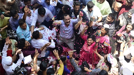 NCP workers celebrate outside party office in Mumbai after committee's decision rejecting Pawar's resignation. &nbsp;&nbsp;(Anshuman Poyrekar/ Hindustan Times)