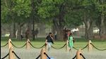 People caught in the rain at Kartavya Path in New Delhi on Sunday. (Hindustan Times) People caught in the rain at Kartavya Path in New Delhi on Sunday. (Hindustan Times)