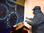 An illustration of the novel coronavirus seen next to a health care worker at a Covid-19 testing centre.(Sanchit Khanna / HT Photo (For representation)) An illustration of the novel coronavirus seen next to a health care worker at a Covid-19 testing centre.(Sanchit Khanna / HT Photo (For representation))