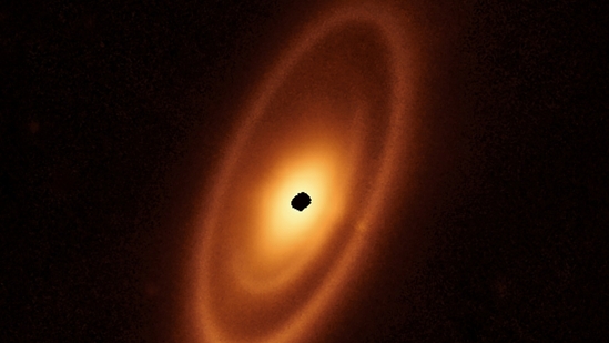 This image of the dusty debris disk surrounding the star Fomalhaut is from the James Webb Space Telescope. (via Reuters)