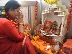 Sushma Kharwal offering prayers after getting elected as mayor of Lucknow. Sushma Kharwal offering prayers after getting elected as mayor of Lucknow.
