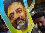 Supporters of senior Congress leader DK Shivakumar outside the venue of the Congress Legislature Party (CLP) meeting in Bengaluru on Sunday. (PTI) Supporters of senior Congress leader DK Shivakumar outside the venue of the Congress Legislature Party (CLP) meeting in Bengaluru on Sunday. (PTI)