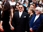 For the occasion, the actor donned a formal look in a black and white Dior tuxedo. (REUTERS)