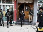 The vigilant security personnel thoroughly inspect hotels in the Lal Chowk area, engaged in discussions with their proprietors to ensure stringent safety measures ahead of G20 summit.(Waseem Andrabi/HT Photo) The vigilant security personnel thoroughly inspect hotels in the Lal Chowk area, engaged in discussions with their proprietors to ensure stringent safety measures ahead of G20 summit.(Waseem Andrabi/HT Photo)