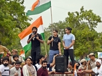 Top wrestlers Vinesh Phogat, Sakshi Malik and Bajrang Punia with supporters during their candlelight protest march, at India Gate, in New Delhi Tuesday.(HT Photo/Sanjeev Verma) Top wrestlers Vinesh Phogat, Sakshi Malik and Bajrang Punia with supporters during their candlelight protest march, at India Gate, in New Delhi Tuesday.(HT Photo/Sanjeev Verma)