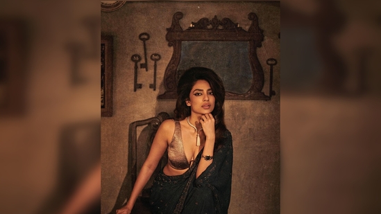 The highlight of Sobhita Dhulipala's look is the volumised retro rolled-back updo hairstyle. (Instagram/@sobhitad)