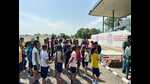 Players waiting in queue for trials in Barnala. (HT Photo) Players waiting in queue for trials in Barnala. (HT Photo)
