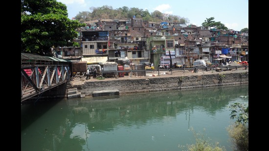 A view of Janata Vasahat slums in Parvati area. (HT FILE PHOTO) A view of Janata Vasahat slums in Parvati area. (HT FILE PHOTO)