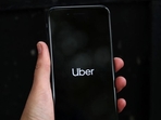 Uber's logo is displayed on a mobile phone.(REUTERS) Uber's logo is displayed on a mobile phone.(REUTERS)