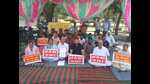 Dadumajra residents, along with area councillor Kuldeep Dhalor, staging a protest outside the Dadumajra dumping ground in Chandigarh on Thursday. (HT Photo) Dadumajra residents, along with area councillor Kuldeep Dhalor, staging a protest outside the Dadumajra dumping ground in Chandigarh on Thursday. (HT Photo)