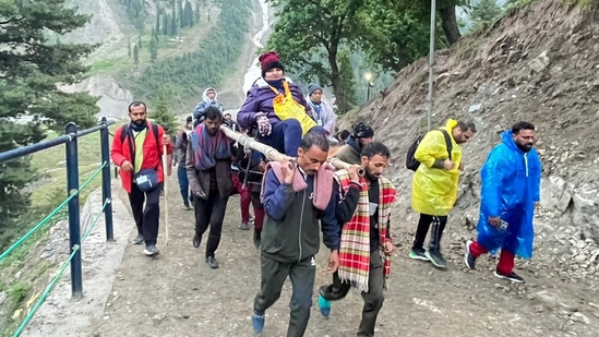First batch of Amaranth yatra pilgrims leaves from Baltal base camp to holy cave.( Waseem Andrabi/Hindustan Times) First batch of Amaranth yatra pilgrims leaves from Baltal base camp to holy cave.( Waseem Andrabi/Hindustan Times)