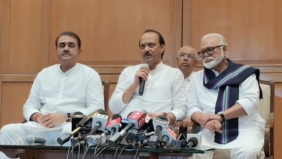 Ajit Pawar during a press conference in Mumbai after being sworn in as the deputy chief minister, is joined by Chhagan Bhujbal and Praful Patel, who were also inducted into the state cabinet. "We joined for the purpose of development. Modi is leading the country and working towards its progress. We felt the need to support him," Pawar said.(HT Photo/Anshuman poyrekar)