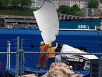Debris from the Titan submersible, recovered from the ocean floor near the wreck of the Titanic, is unloaded from the ship Horizon Arctic at the Canadian Coast Guard pier in St. John's, Newfoundland, Wednesday, June 28, 2023. (Paul Daly/The Canadian Press via AP)(AP) Debris from the Titan submersible, recovered from the ocean floor near the wreck of the Titanic, is unloaded from the ship Horizon Arctic at the Canadian Coast Guard pier in St. John's, Newfoundland, Wednesday, June 28, 2023. (Paul Daly/The Canadian Press via AP)(AP)