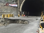 Part of the Jammu-Srinagar national highway that caved in amid heavy rainfall on Saturday. (HT Photo ) Part of the Jammu-Srinagar national highway that caved in amid heavy rainfall on Saturday. (HT Photo )