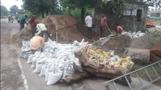 Work underway to divert Ghaggar’s flow. (HT Photo) Work underway to divert Ghaggar’s flow. (HT Photo)