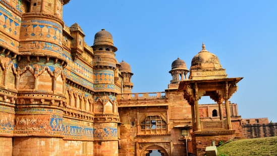 Gwalior Fort: Gwalior Fort is perched on a hilltop in the city of Gwalior. This imposing structure boasts a rich history that spans over a thousand years. The fort showcases a blend of Rajput and Mughal architectural styles and houses several palaces, temples, and ornate structures.(Chirag Vashist on Unsplash)