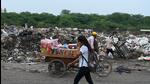 Garbage dumped along the roadside in Udyog Vihar in Gurugram. (Parveen Kumar/ HT) Garbage dumped along the roadside in Udyog Vihar in Gurugram. (Parveen Kumar/ HT)