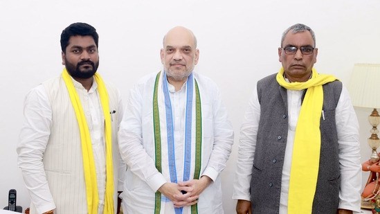 Union home minister Amit Shah with OP Rajbhar (right) Union home minister Amit Shah with OP Rajbhar (right)
