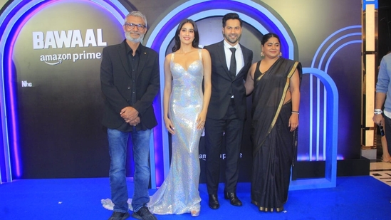 The Bawaal team at the special screening of the film in Mumbai on Tuesday. Black was the theme of the night for which director Nitesh Tiwari, story writer Ashwiny Iyer Tiwari and actor Varun Dhawan arrived in black. Janhvi Kapoor chose a hologram dress for the evening and truly caught the spotlight.&nbsp;
