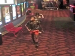 Screengrab of the clip showing the suspect going out of the theatre. (Twitter ) Screengrab of the clip showing the suspect going out of the theatre. (Twitter )