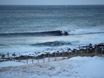 A surfer rides a wave at Unstad along the northern Atlantic Ocean. (Olivier Morin/AFP) A surfer rides a wave at Unstad along the northern Atlantic Ocean. (Olivier Morin/AFP)