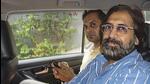 Dinesh Arora in ED custody in July. (PTI) Dinesh Arora in ED custody in July. (PTI)