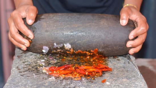 “The shil-nora grinding mustard to a paste, the sound of two stones arguing and agreeing.” (Shutterstock) “The shil-nora grinding mustard to a paste, the sound of two stones arguing and agreeing.” (Shutterstock)