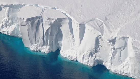 An aerial view of the 200-foot-tall (60-meter-tall) front of the Getz Ice Shelf with cracks, in Antarctica, in this 2016 handout image.&nbsp;(NASA/REUTERS)