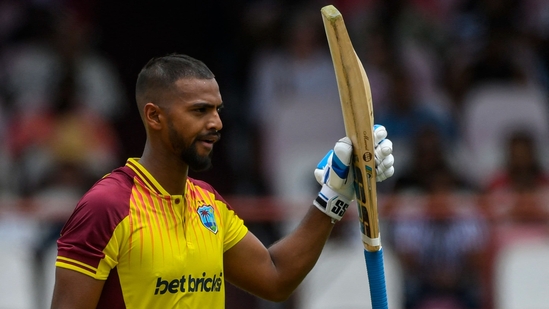Nicholas Pooran celebrates his half century during the 2nd T20I between West Indies and India at Guyana National Stadium in Providence, Guyana(AFP)