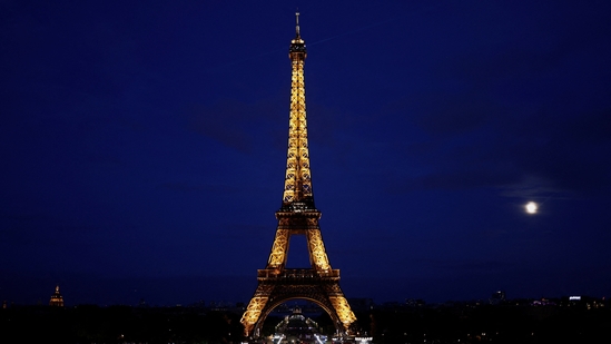 A view shows the illuminated Eiffel Tower in Paris, France, July 30, 2023. REUTERS/Benoit Tessier(REUTERS)