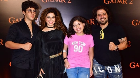 Bakhtiyar Irani and wife Tanaaz Irani with kids at the screening of Gadar 2. The film released on Friday amid much anticipation and clashed with Akshay Kumar's OMG 2 in theatres. 