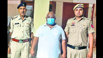 Bittu Bajrangi in police custody. Bittu Bajrangi in police custody.