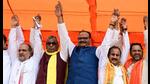Deputy CM Brajesh Pathak flanked by SBSP chief OP Rajbhar (L) and BJP candidate Dara Singh Chauhan (R) and others at a public meeting in Ghosi. (Sourced) Deputy CM Brajesh Pathak flanked by SBSP chief OP Rajbhar (L) and BJP candidate Dara Singh Chauhan (R) and others at a public meeting in Ghosi. (Sourced)