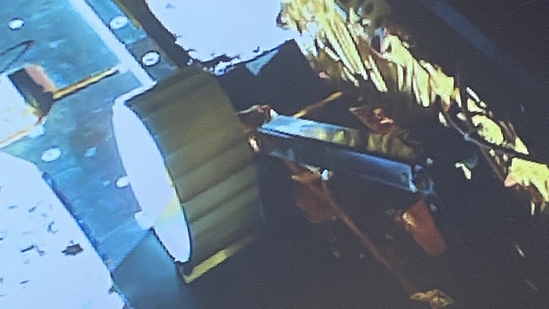 First photo of Rover coming out of the lander on the ramp. First photo of Rover coming out of the lander on the ramp.