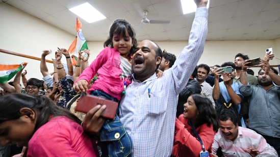 People celebrate after successful landing Chandrayaan 2.0 on moon at Nehru Planetarium in New Delhi, India. (Hindustan Times)